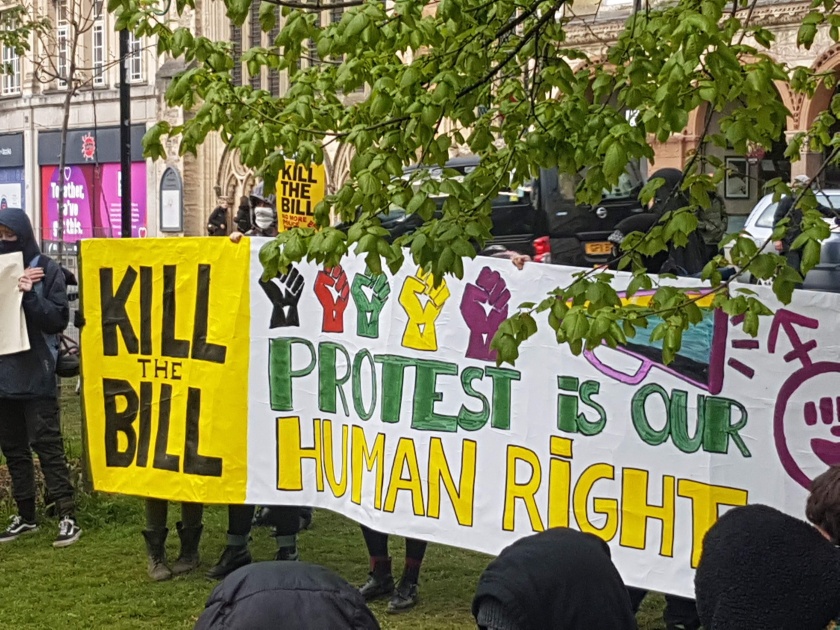 Large banner held up at a Kill The Bill demo on College Green. Banner reads: "Kill the Bill - Protest is our human right"